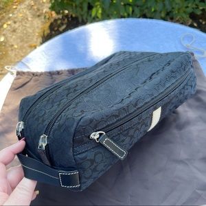 Coach Signature “C” Toiletry Bag